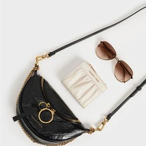Charles & Keith Philomena Wrinkled-Effect Half-Moon Crossbody Bag